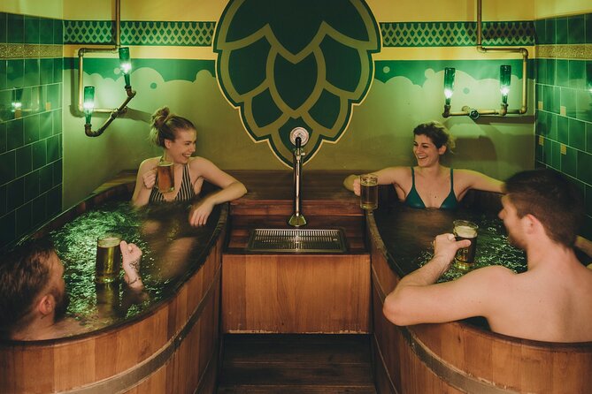 people enjoying beer inside the Széchenyi Baths beer spa in budapest, hungary