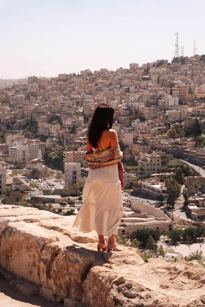 female standing in front of amman citadel viewpoint