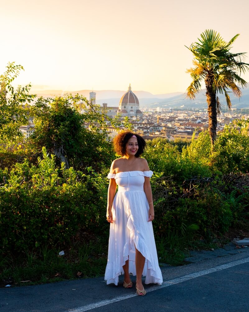 Sunset at Piazzale Michelangelo female standing in front of view