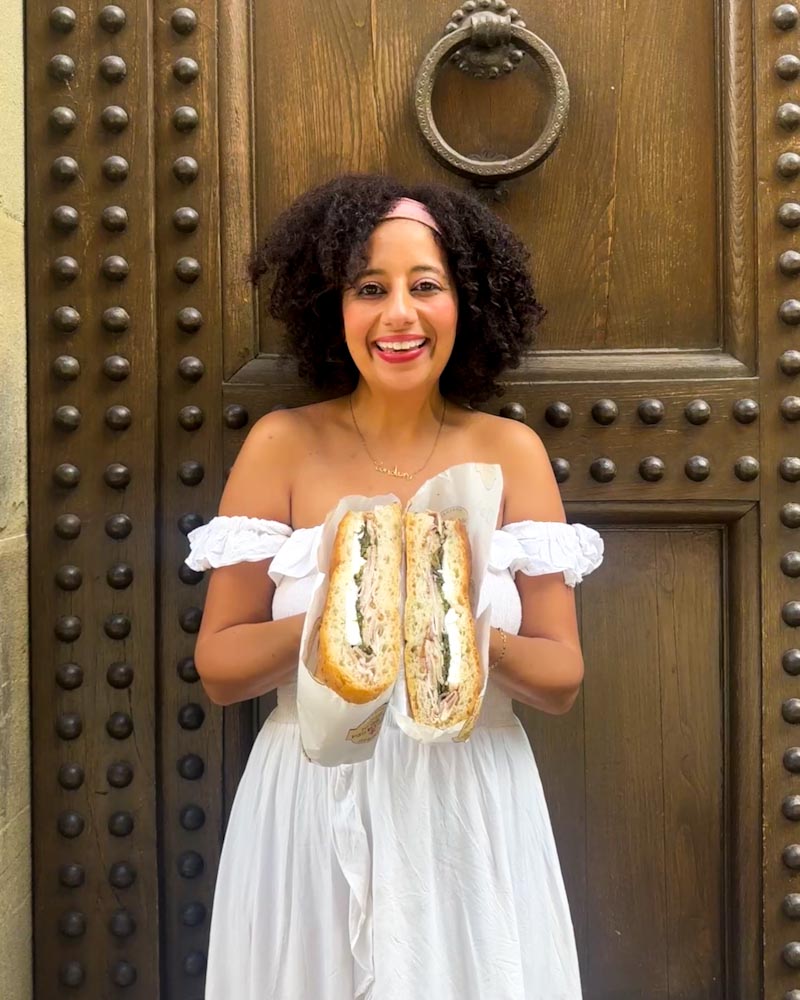 best panini in florence female holding sandwich