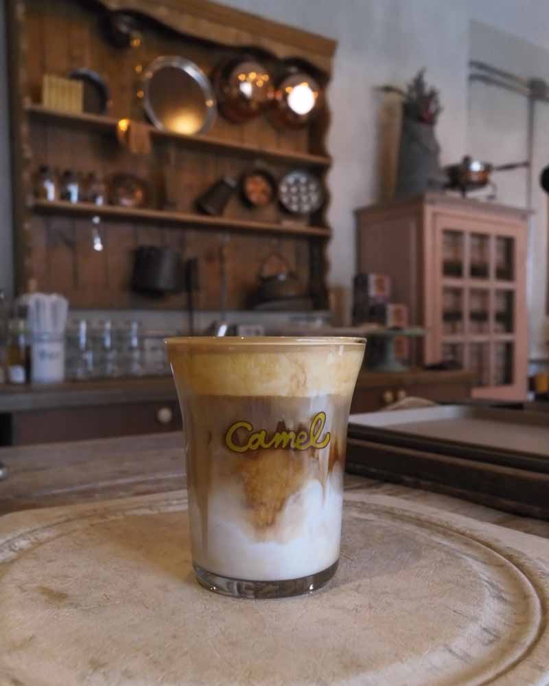 Layered coffee in a glass at camel coffee shop in seoul