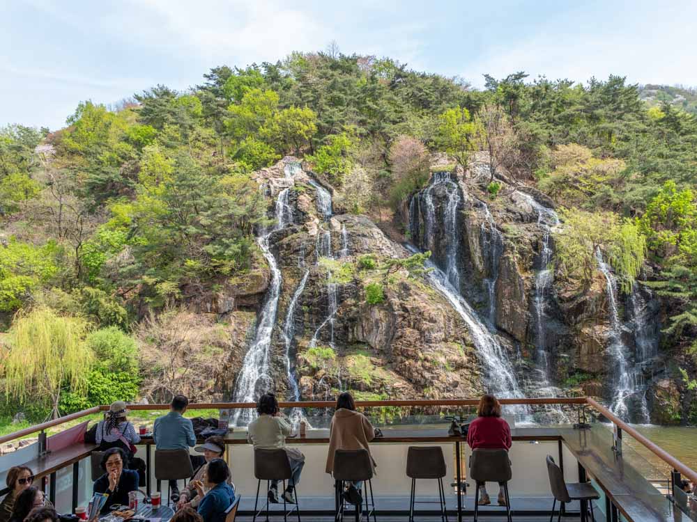 waterfall view from cafe pokpo in seoul most unique cafes