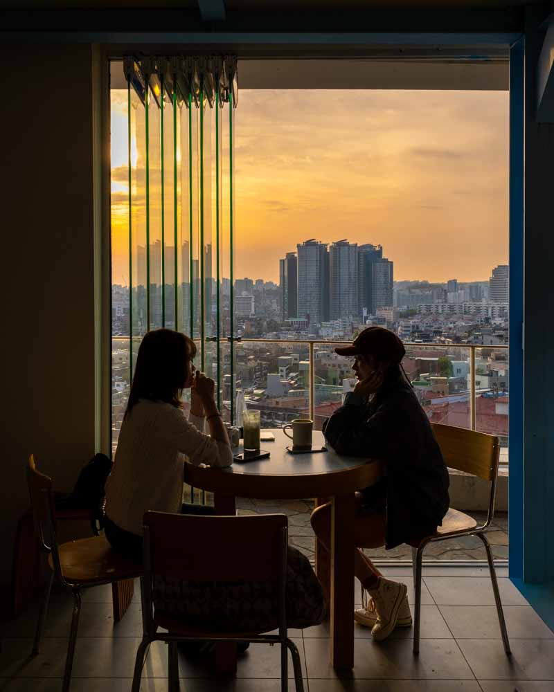 Two people enjoying sunset view