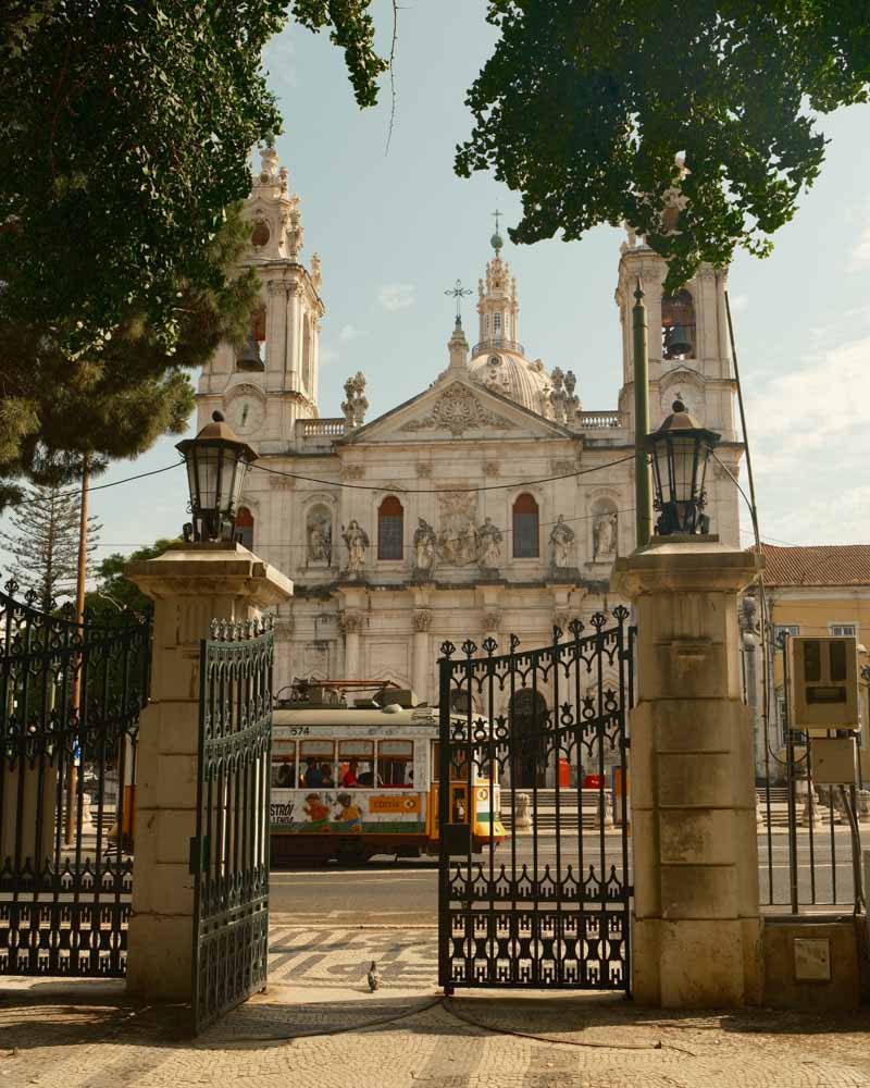 Basilica of Estrela with trams passing by in Lisbon