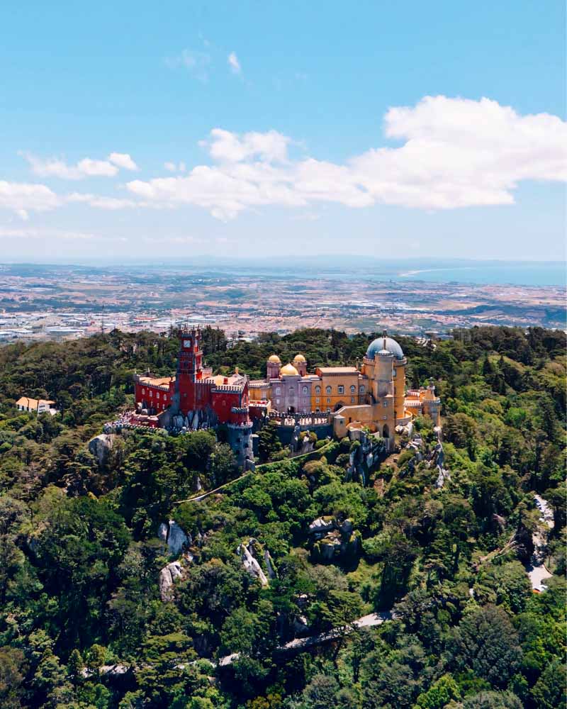 pena palace drone view of castle best things to do in Sintra on a day trip
